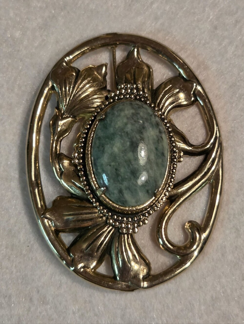 Vintage Gold-Tone Floral Oval Brooch with Green Stone